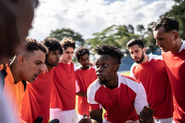 istock Soccer team captain talking to the team before a match 1398368031