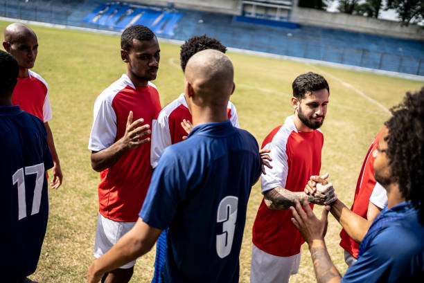 istock Soccer players teams greeting before a match 1398368037