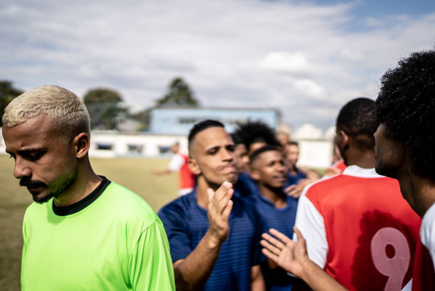 istock Soccer players teams greeting before a match 1398368039