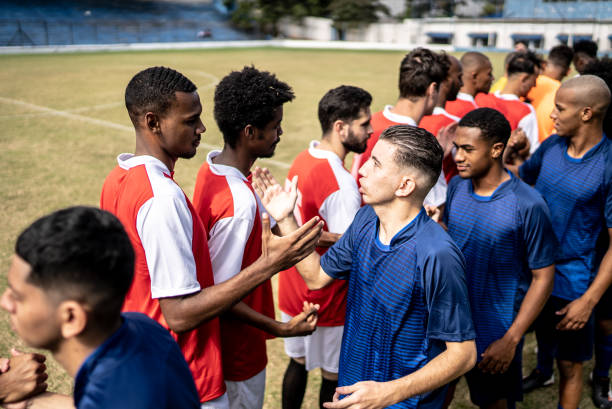 istock Soccer players teams greeting before a match 1398368042
