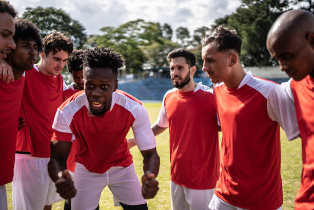istock Soccer team captain talking to the team before a match 1398368048