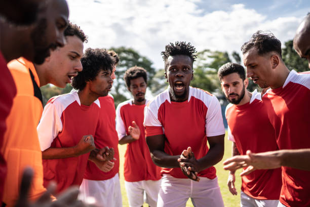 istock Soccer team captain talking to the team before a match 1398368059