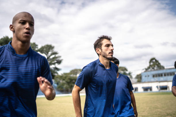 istock Soccer players warming up before a match 1398368767