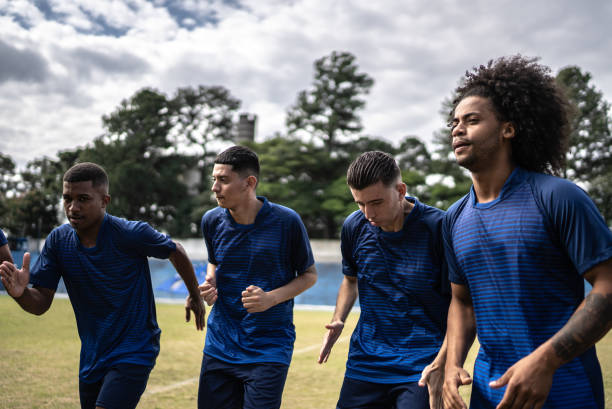 istock Soccer players warming up before a match 1398368772