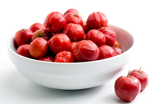 Acerola cherry fruit, also known as Barbados Cherry, is a tropical exotic fruit, extremely rich in vitamin C.