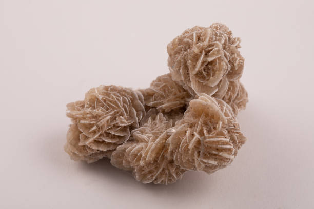 Desert Rose, Natural Crystal on white background, close up photography