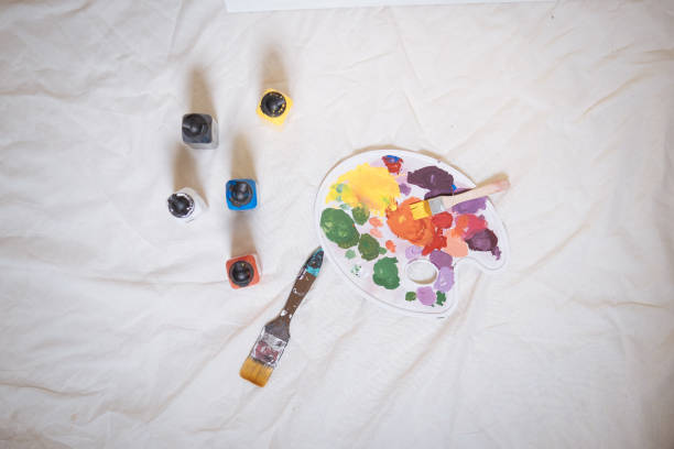 istock palette paints and paints on fabric background studio shot 1398377291