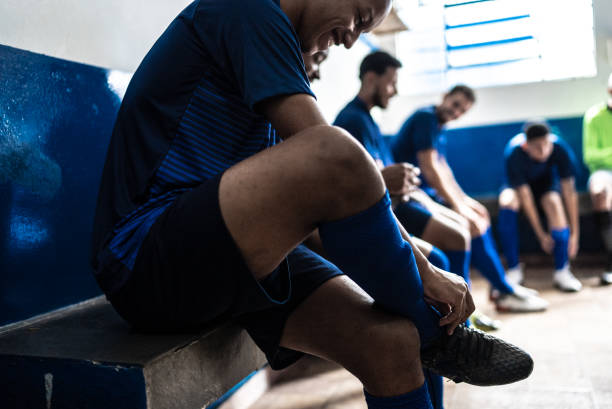 istock Soccer team preparing for match in the locker room 1398379109