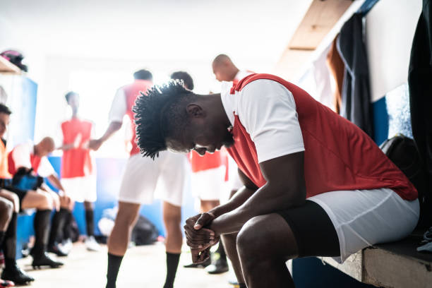 Soccer player in the locker room