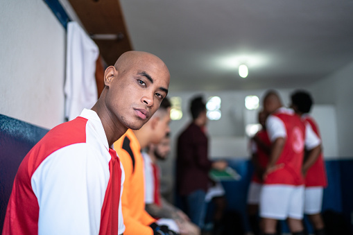 Portrait of a soccer player in the locker room