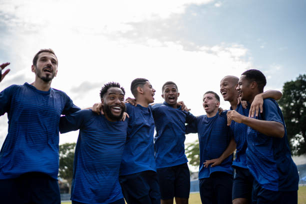 istock Soccer players celebrating a goal 1398380350