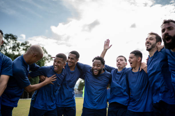 istock Soccer players celebrating a goal 1398380357
