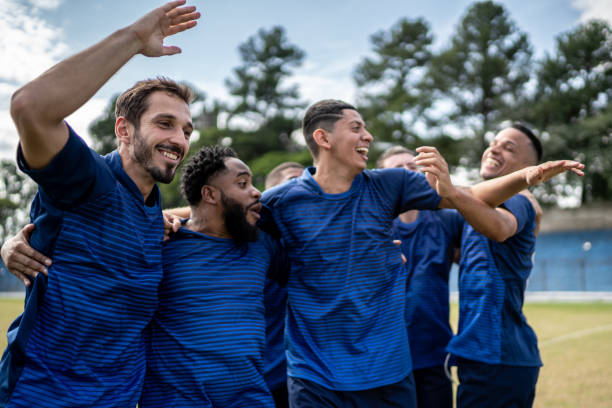 istock Soccer players celebrating a goal 1398380359
