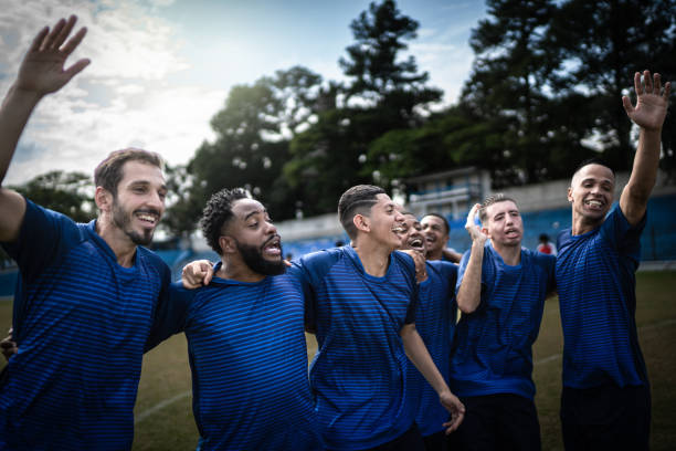 istock Soccer players celebrating a goal 1398380363