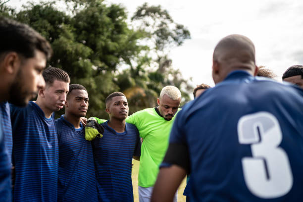 istock Team captain talking with players before a match 1398380383