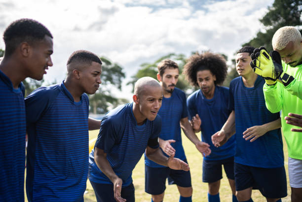 istock Team captain talking with players before a match 1398380412