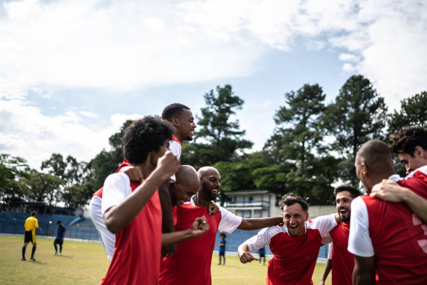 istock Soccer players celebrating a goal 1398380535