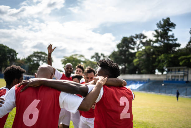 istock Soccer players celebrating a goal 1398380544
