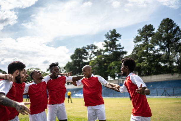 istock Soccer players celebrating a goal 1398380568