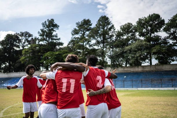 istock Soccer players celebrating a goal 1398380576