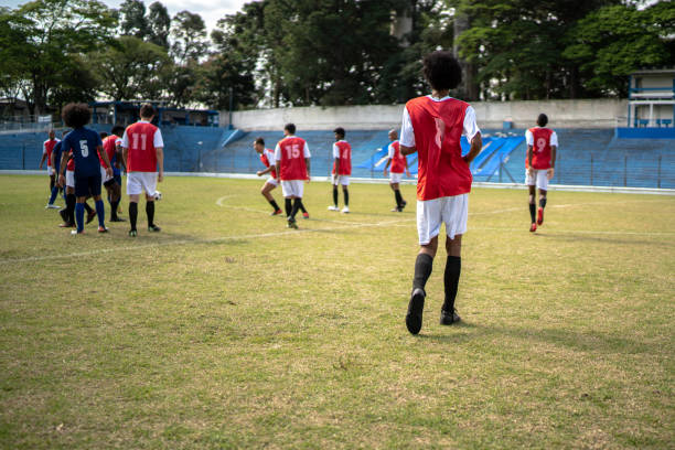 istock Soccer players during match 1398380695