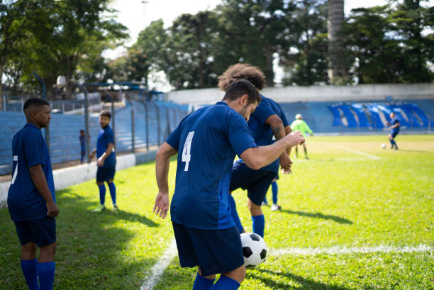 istock Soccer players warming up before a match 1398380746