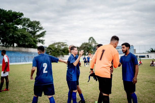 istock Soccer players greeting on the field 1398380770