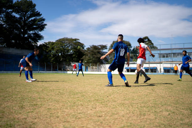 istock Soccer teams playing soccer match 1398380923