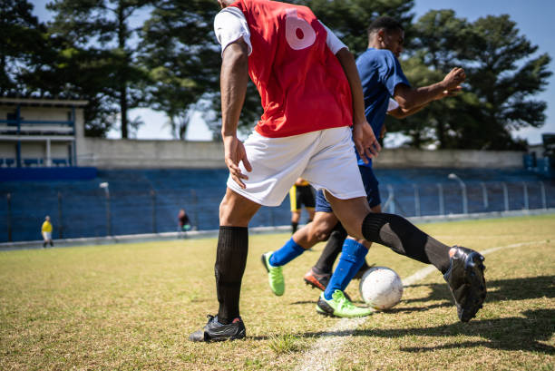 istock Soccer teams playing soccer match 1398380941