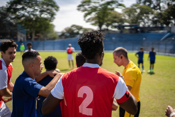 istock Soccer players complaining with referee during the match 1398380967