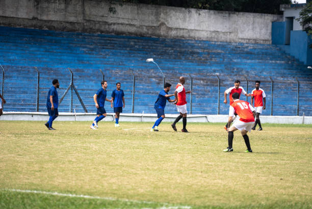 istock Soccer teams playing soccer match 1398381010
