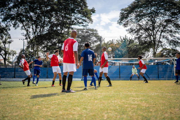 istock Soccer teams playing soccer match 1398381016