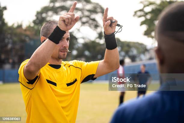 Referee Gesturing To Check Var Stock Photo - Download Image Now - Var, Referee, Soccer