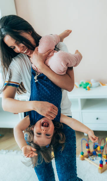istock Mother and toddler having fun 1398382755