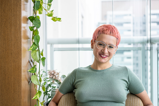 Portrait of a non-binary person with dye hair