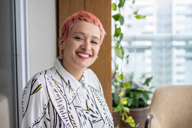 Portrait of a non-binary person with dye hair Portrait of a non-binary person with dye hair non binary gender stock pictures, royalty-free photos & images