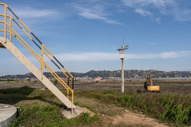 Beaches, windmills and excavators parked