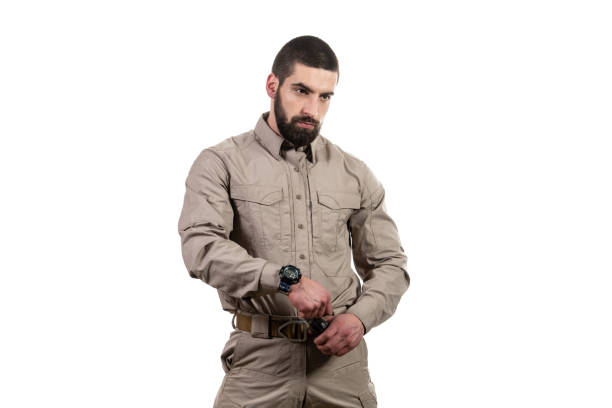 istock Young Man Holding a Bomb on White Background 1398388590