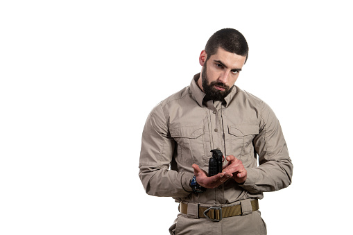 Man With a Bomb in His Hand on White Background