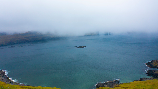 Faroe Islands - It's foggy, cold, windy and rainy, but nature is magnificent.