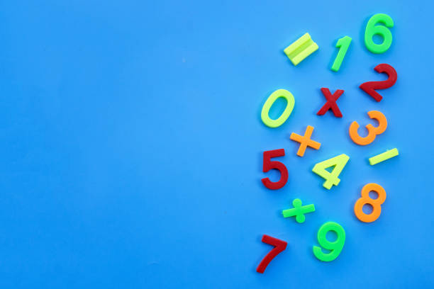colorful toy blocks one plus one equal to question mark.