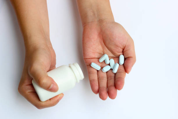 istock Hands with PrEP pills. prep in a pills. HIV prevention 1398396831