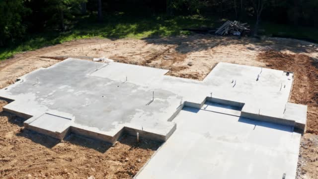New Home under construction with concrete foundation
