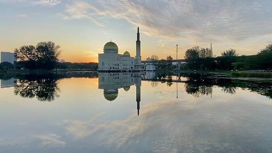 A beautiful morning at As-Salam Mosque with reflection
