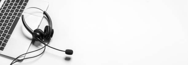 istock Headset and customer support equipment at call center ready for actively service , Communication support, call center and customer service help desk.for (call center) concept . 1398406088