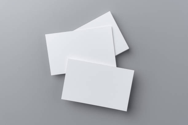 istock three business card isolated on grey background 1398407013