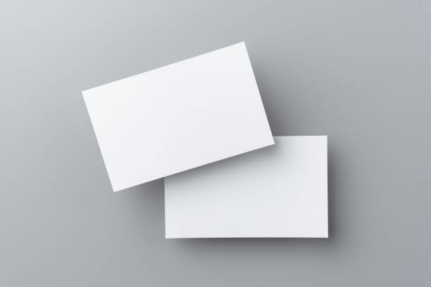 two business card isolated on grey background