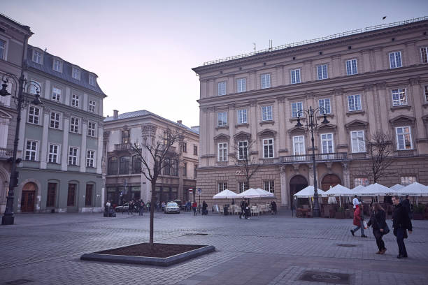 Krakow, Poland - March 28, 2014 : View of street restaurants at Rynek Glowny square
