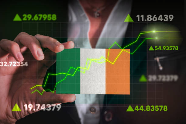 Graph growing up in Front Of Ireland Flag. stock photo