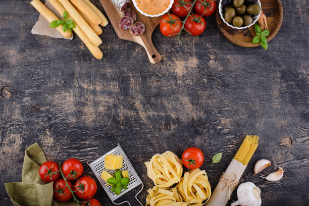 istock Italian food cooking background with pasta 1398412374